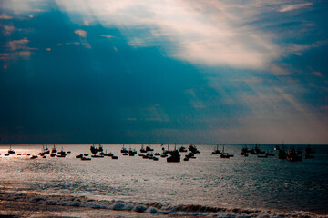Naklejka premium Playa y botes de pesca 