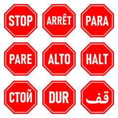 Set of Octagonal Red Stop Signs in Various Languages including English, French, Spanish, Portuguese, German, Russian, Turkish and Arabic. Vector Image.