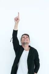 smiling guy pointing up at copy space.