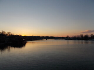 Obraz premium sunset on the river