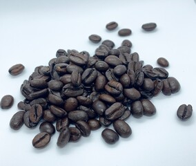 Roast coffee beans on white background