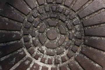 brown cover of the sewer manhole