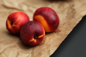 Nectarine on wooden background
