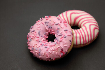 pink donut with sprinkles