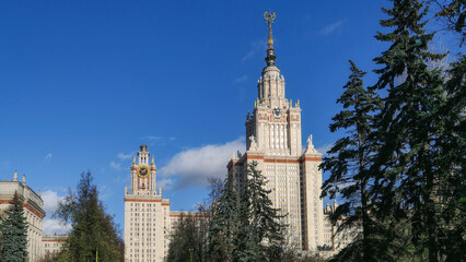 Fototapeta na wymiar Autumn park and sunny campus of old university in Moscow