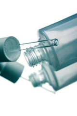Skin care science. A bottle with a pipette. Isolated closeup