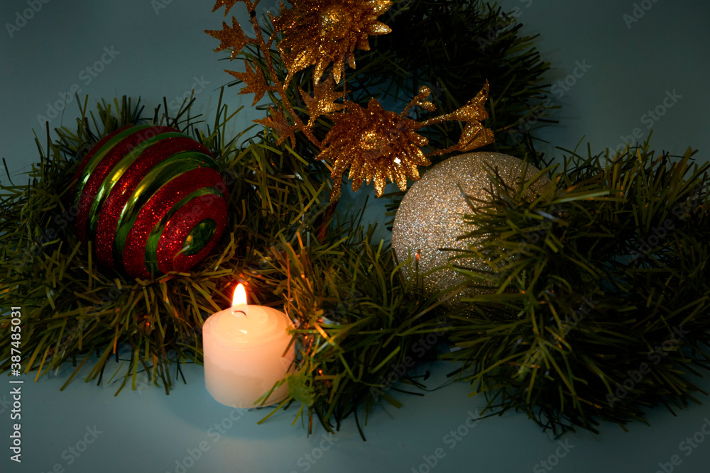 Wall mural christmas candle and balls multicolored light. christmas concept.