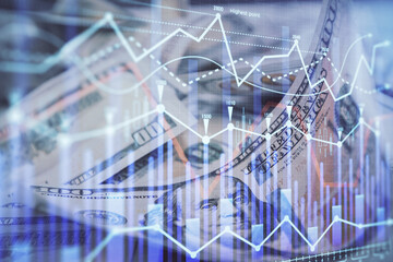 Double exposure of forex graph drawing over us dollars bill background. Concept of financial markets.