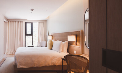 bed in bedroom hotel. background for vacation and holiday.