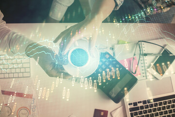 Double exposure of man and woman working together and financial chart hologram drawing. market analysis concept. Computer background. Top View.