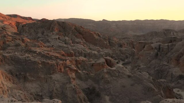 Aerial Flight, Rock Canyon of Jordan Desert during Sunrise