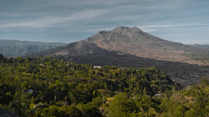 Fototapeta premium high volcano with clouds on Bali island in Indonesia