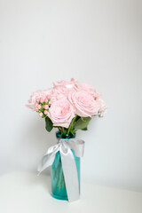 Beautiful flowers in the glass vase.