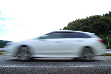 Fototapeta na wymiar speeding car on the highway