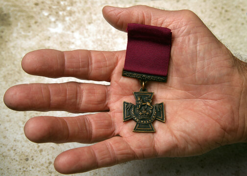 The Victoria Cross resting in the hands of an Australian Digger. This is the highest acclamation for valour a soldier can be awarded.
