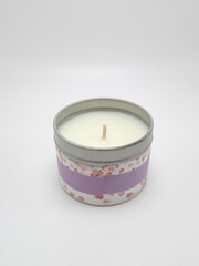 White scented candle in metal case