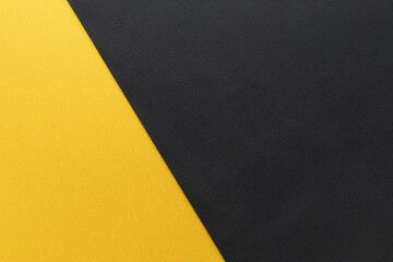 黄色の紙と黒い革