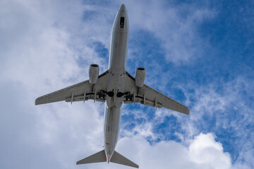 Beneath airplane in flight