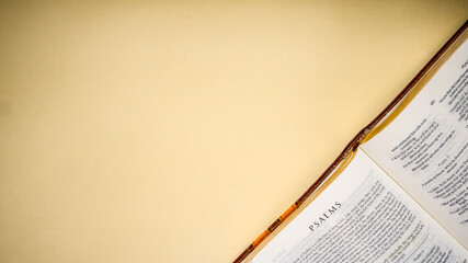 Open pages of the bible background (book of Psalms)