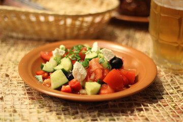 salad with side dish on the table in a restaurant