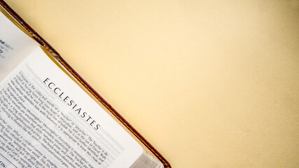 Open pages of the bible background (book of Ecclesiastes)