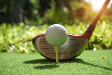 Golf balls on the golf course with golf clubs ready for golf in the first short. In the morning,...