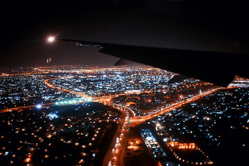 Fototapeta na wymiar night view from the plane, night in the city lights from above view, flight trip