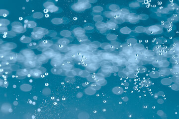 air bubbles in water macro background / blue background abstract bubbles in water