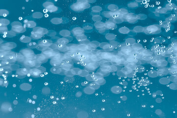 air bubbles in water macro background / blue background abstract bubbles in water