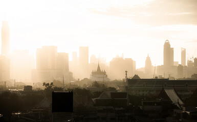 Smog with PM2.5 and light shade in the morning over the ancient temple in city