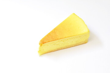 cheesecake cutting in triangle shape on white background