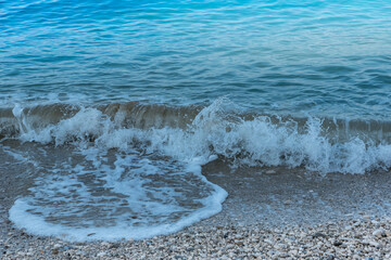 Sea waves on the pebble beach