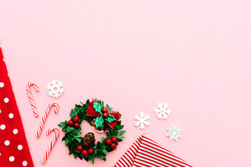 Obraz premium Christmas composition. Christmas gifts, pine branches, toys on pink background. Flat lay, top view.