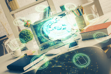 Computer on desktop with social network hologram. Multi exposure. Concept of international people...