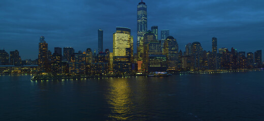 Fototapeta premium view of the city and big building and lightning with river 