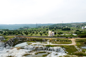 Beautiful place to live cityscape all nature are in this pic water tree home grass and more natures. Peaceful place at mountain side. This pic taken from Bangalore India