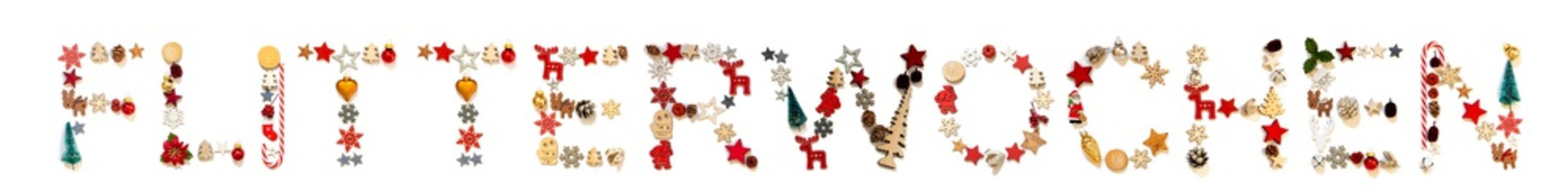 Colorful Christmas Decoration Letter Building German Word Flitterwochen Means Honeymoon. Festive Ornament Like Christmas Tree, Star And Ball. White Isolated Background