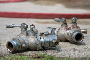 firefighter, fire man The firefighters were collecting the finished equipment after the fire was calm.