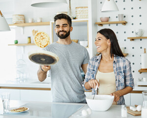 woman couple man happy kitchen  love young pancake together romantic boyfriend girlfriend breakfast - obrazy, fototapety, plakaty