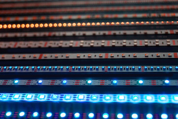 Defocused lights of LED strip, abstract background lights