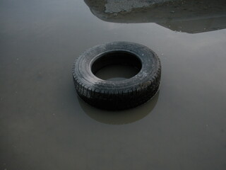 black tire in the water