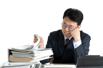 Documents or reports stacked with Asian middle-aged male businessman.