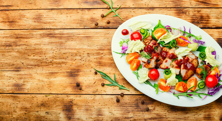 Meat salad with fresh vegetables.