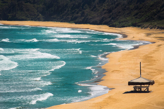 Distant view of an empty sand beach with waves and no people in Sile Istanbul TURKEY