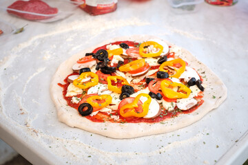 Belegter Pizzateig