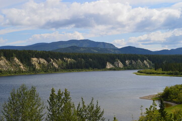 Road tripping through the beautiful landscapes of the Alaskan Highway in the Yukon territory of...