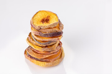 slices of dried peach on a white background. dried fruits. eco. macro.