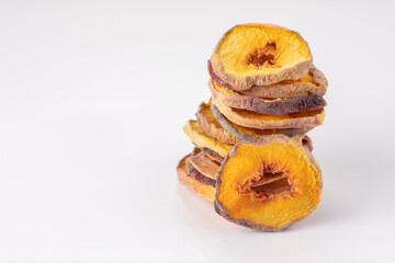 slices of dried peach on a white background. dried fruits. eco. macro.