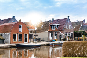 Residential buildings and canal in Hindeloopen, Netherlands, Europe