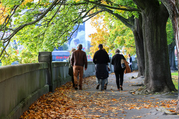 KRAKOW,POLAND - OCTOBER 09, 2020: Old people are walking in the park